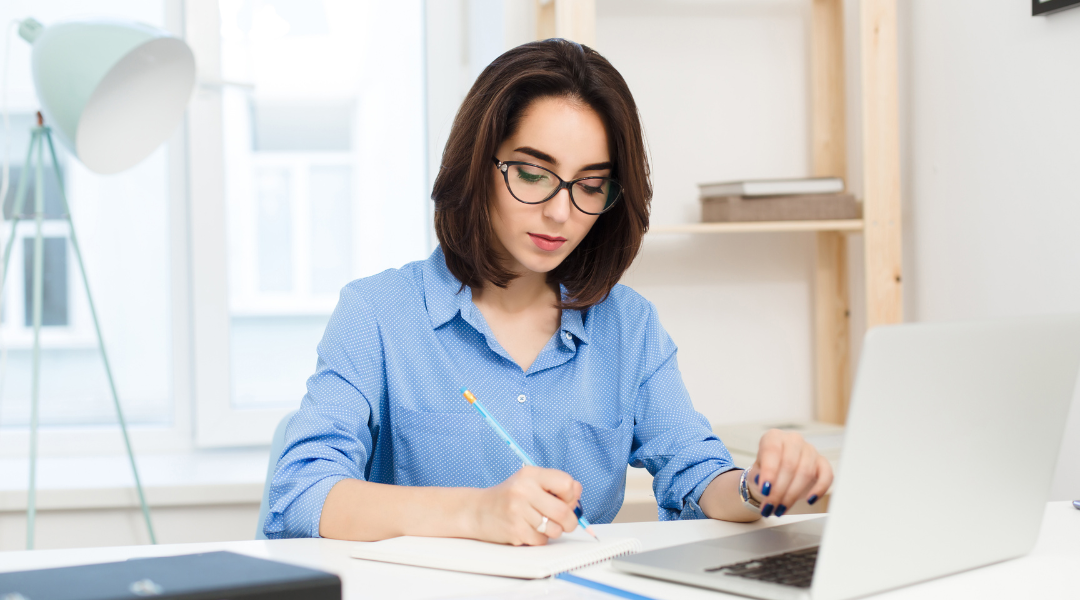 Girl is writing proofreading tips