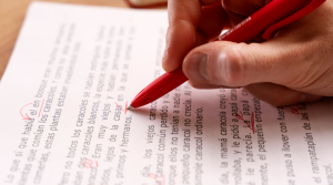A girl is proofreading her paper